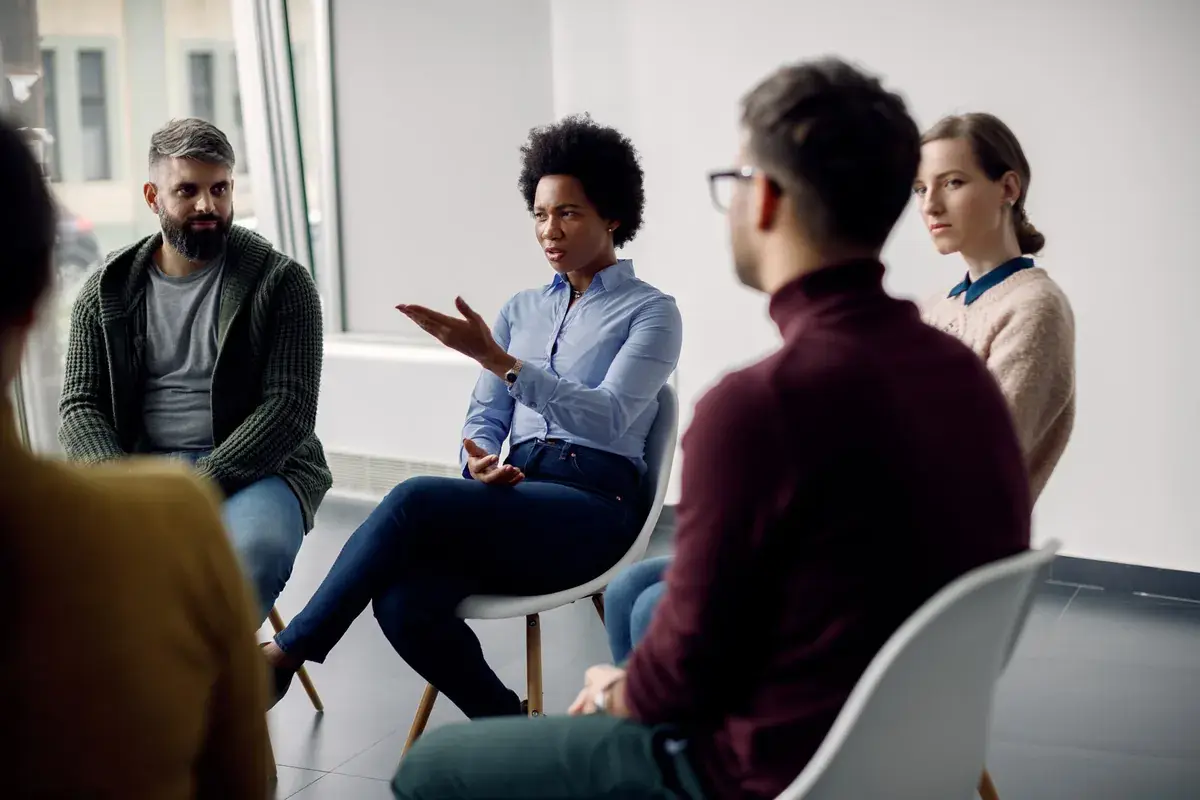 Small group talking together during a Christ-centered group discipleship class